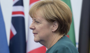 Меркель сочла преждевременными разговоры об отмене санкций против РФ