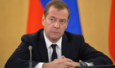 Медведев пообещал сохранить плоскую шкалу НДФЛ