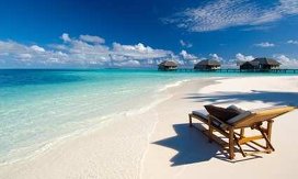 Виллы и пляж спа-отеля Conrad Maldives