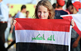 Девочка с национальном флагом Ирака