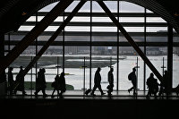Пассажиры в Международном аэропорту Стамбул