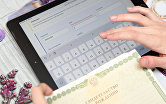Экран планшета с заявлением о предоставлении единовременной выплаты на детей от 3 до 16 лет на портале Госуслуг.