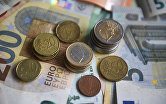 Денежные купюры и монеты евро